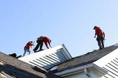 Picture of many roofers working