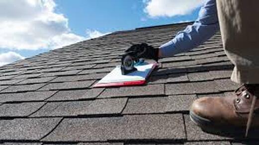 Picture or roofer with level